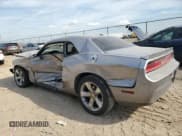 ✅ 2014 Dodge Challenger SXT • VIN: 2C3CDYAG4EH210023 • Lot: 77484374. Wystawiony na Copart z przebiegiem Nie podano. Bezpłatny archiwum sprzedaży aukcyjnych z USA i szczegółowy raport historii pojazdu na DreamBid. Zdjęcie 2.