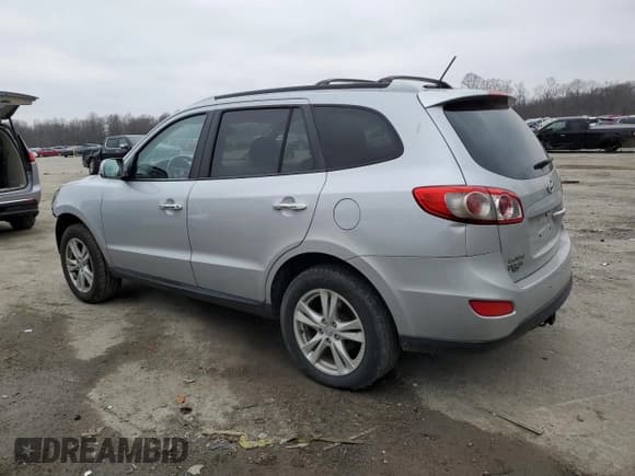 ✅ 2010 Hyundai Santa Fe Limited • VIN: 5NMSKDAG3AH383424 • Lot: 79738844. Listed on Copart with 174,729 mi. Free auction sales archive from the USA and detailed vehicle history report at DreamBid. Image 2.