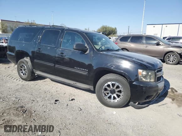 ✅ 2011 Chevrolet Suburban LT • VIN: 1GNSKJE3XBR385634 • Lot: 80205155. Listed on Copart with 182,201 mi. Free auction sales archive from the USA and detailed vehicle history report at DreamBid. Image 4.
