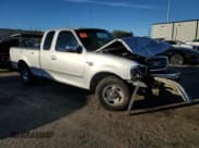 ✅ 2000 Ford F-150 XL • VIN: 1FTRX17W4YKB41883 • Lot: 92127065. Listed on Copart with 170,725 mi. Free auction sales archive from the USA and detailed vehicle history report at DreamBid. Image 4.