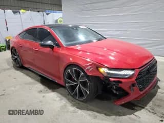 ✅ 2022 Audi RS 7 • VIN: WUAPCBF25NN904045 • Лот: 48138785. Опубликован ранее на Copart с пробегом 43 137 миль. Бесплатный доступ к архиву аукционных продаж из США и подробный отчёт об истории автомобиля на DreamBid. Изображение 4.