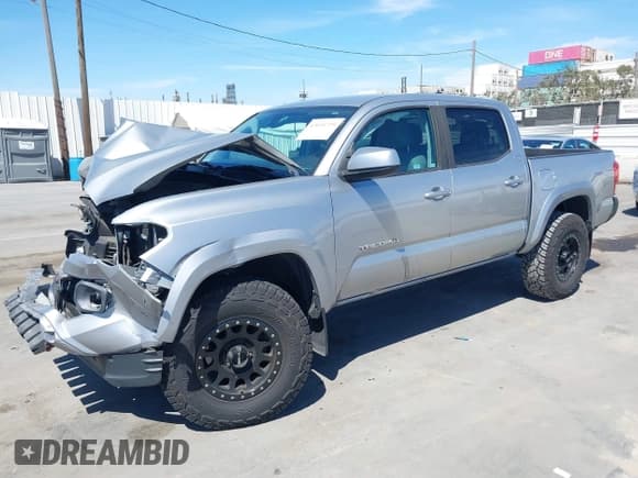 ✅ 2019 Toyota Tacoma SR5 • VIN: 3TMAZ5CN8KM089539 • Lot: 43034725. Listed on IAAI with 51,267 mi. Free auction sales archive from the USA and detailed vehicle history report at DreamBid. Image 18.