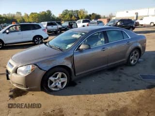 ✅ 2012 Chevrolet Malibu 1LS • VIN: 1G1ZB5E04CF237110 • Lot: 85343385. Listed on Copart with 159,026 mi. Free auction sales archive from the USA and detailed vehicle history report at DreamBid. Image 1.