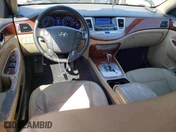 2014 Hyundai Genesis 3.8L z VIN KMHGC4DD7EU264239, wystawiony jako Copart lot #69198604 z przebiegiem 171 305 mil mil oraz Szkoda całkowita • Salvage title. Historia ofert i sprzedaży dostępna na DreamBid. Obrazek 8.