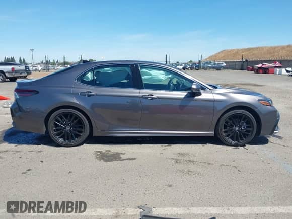 2023 Toyota Camry XSE with VIN 4T1K61BK7PU099474, listed as a IAAI auction lot 42249023 with 26,029 mi miles and . Bid and sale history available at DreamBid. Image 12.