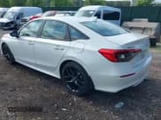 ✅ 2023 Honda Civic Sport • VIN: 2HGFE2F50PH570467 • Lot: 42684104. Listed on IAAI with 23,568 mi. Free auction sales archive from the USA and detailed vehicle history report at DreamBid. Image 3.