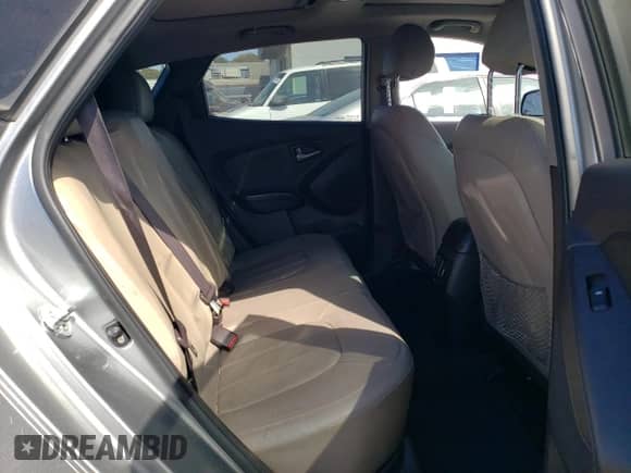 2015 Hyundai Tucson SE z VIN KM8JU3AG7FU098981, wystawiony jako Copart lot #71804224 z przebiegiem 179 496 mil mil oraz Czysty tytuł • Clean title. Historia ofert i sprzedaży dostępna na DreamBid. Obrazek 10.