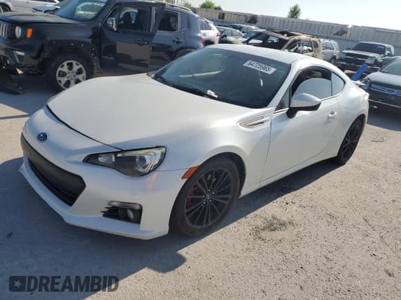 ✅ 2013 Subaru BRZ Limited • VIN: JF1ZCAC15D1604688 • Lot: 64725965. Listed on Copart with 132,879 mi. Free auction sales archive from the USA and detailed vehicle history report at DreamBid. Image 1.