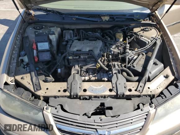 2004 Chevrolet Impala with VIN 2G1WF52E949127977, listed as a Copart auction lot 71259914 with 103,782 mi miles and Salvage title. Bid and sale history available at DreamBid. Image 11.
