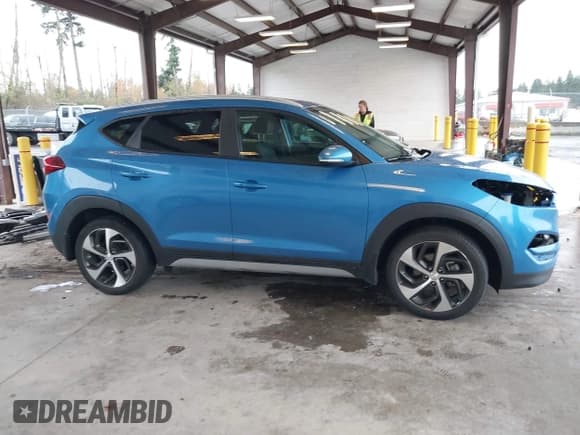 ✅ 2018 Hyundai Tucson Sport • VIN: KM8J3CAL6JU738770 • Lot: 43681721. Listed on IAAI with 64,412 mi. Free auction sales archive from the USA and detailed vehicle history report at DreamBid. Image 14.