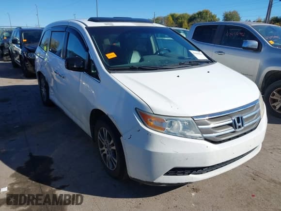 ✅ 2012 Honda Odyssey EX-L • VIN: 5FNRL5H6XCB013011 • Lot: 43469056. Listed on IAAI with 240,505 mi. Free auction sales archive from the USA and detailed vehicle history report at DreamBid. Image 1.