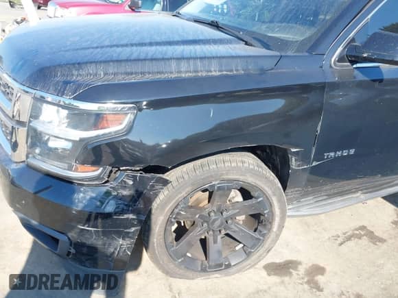 2018 Chevrolet Tahoe LT z VIN 1GNSKBKC8JR128657, wystawiony jako IAAI lot #43151589 z przebiegiem 157 909 mil mil oraz . Historia ofert i sprzedaży dostępna na DreamBid. Obrazek 6.