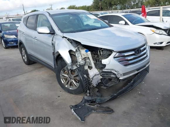 ✅ 2014 Hyundai Santa Fe • VIN: 5XYZT3LB1EG162718 • Лот: 43236826. Опубликован ранее на IAAI с пробегом 197 087 миль. Бесплатный доступ к архиву аукционных продаж из США и подробный отчёт об истории автомобиля на DreamBid. Изображение 6.