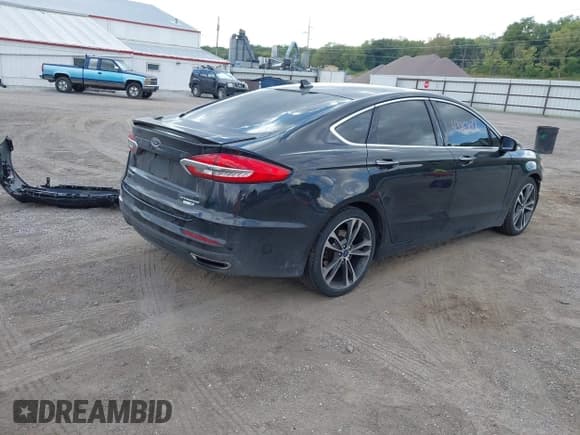 ✅ 2019 Ford Fusion Titanium • VIN: 3FA6P0D95KR187128 • Лот: 43262017. Опубликован ранее на IAAI с пробегом 133 379 миль. Бесплатный доступ к архиву аукционных продаж из США и подробный отчёт об истории автомобиля на DreamBid. Изображение 4.