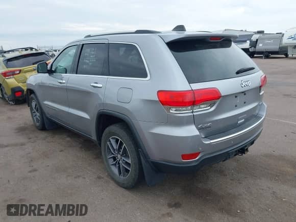 2018 Jeep Grand Cherokee Sterling z VIN 1C4RJFBG3JC138410, wystawiony jako IAAI lot #43242404 z przebiegiem 119 655 mil mil oraz . Historia ofert i sprzedaży dostępna na DreamBid. Obrazek 3.