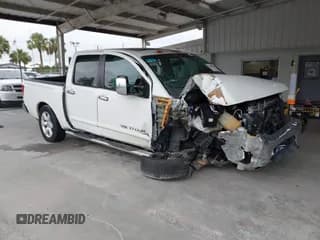 ✅ 2015 Nissan Titan SV • VIN: 1N6BA0ED1FN502929 • Lot: 42431227. Listed on IAAI with 138,394 mi. Free auction sales archive from the USA and detailed vehicle history report at DreamBid. Image 1.