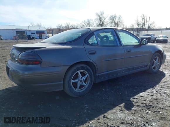 ✅ 2002 Pontiac Grand Prix GT • VIN: 1G2WP52K92F187602 • Lot: 40810075. Listed on IAAI with 2,366,691 mi. Free auction sales archive from the USA and detailed vehicle history report at DreamBid. Image 4.