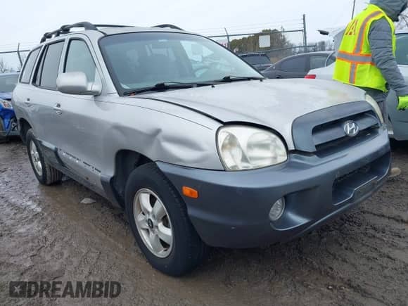 2005 Hyundai Santa Fe GLS z VIN KM8SC73E45U878509, wystawiony jako IAAI lot #41776048 z przebiegiem 171 478 mil mil oraz . Historia ofert i sprzedaży dostępna na DreamBid. Obrazek 1.