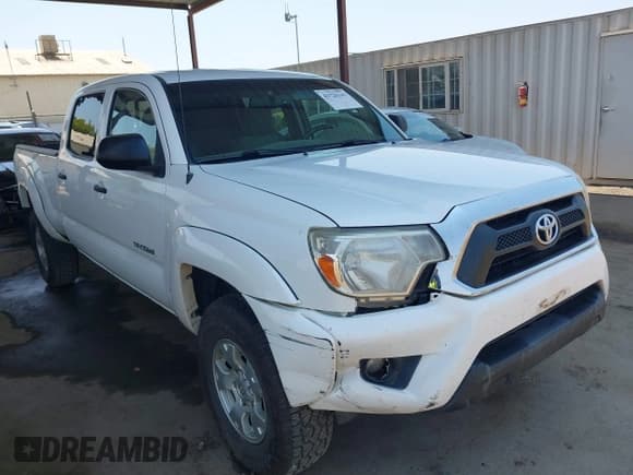 ✅ 2013 Toyota Tacoma • VIN: 3TMMU4FN1DM062073 • Lot: 42726143. Listed on IAAI with 164,700 mi. Free auction sales archive from the USA and detailed vehicle history report at DreamBid. Image 1.