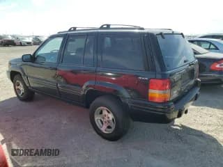 ✅ 1998 Jeep Grand Cherokee Laredo • VIN: 1J4GZ48Y7WC321234 • Лот: 75438624. Опубликован ранее на Copart с пробегом Не указан. Бесплатный доступ к архиву аукционных продаж из США и подробный отчёт об истории автомобиля на DreamBid. Изображение 2.