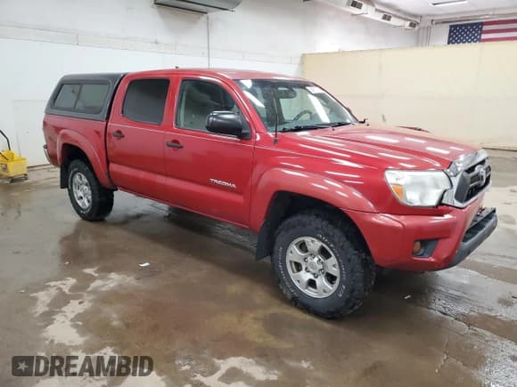 ✅ 2012 Toyota Tacoma • VIN: 3TMLU4EN8CM084471 • Lot: 84811765. Listed on Copart with 121,598 mi. Free auction sales archive from the USA and detailed vehicle history report at DreamBid. Image 4.