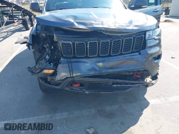 2017 Jeep Grand Cherokee Trailhawk with VIN 1C4RJFLG6HC718727, listed as a IAAI auction lot 43277148 with 92,337 mi miles and . Bid and sale history available at DreamBid. Image 6.