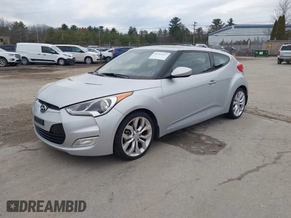 ✅ 2012 Hyundai Veloster w/Gray Int • VIN: KMHTC6AD6CU081281 • Лот: 43797427. Опубликован ранее на IAAI с пробегом 184 987 миль. Бесплатный доступ к архиву аукционных продаж из США и подробный отчёт об истории автомобиля на DreamBid. Изображение 2.