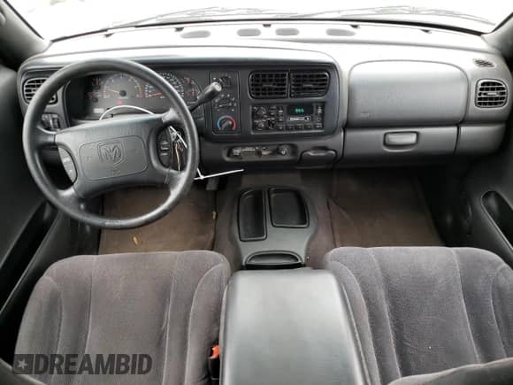 2000 Dodge Dakota z VIN 1B7GL22X4YS517720, wystawiony jako Copart lot #66695224 z przebiegiem 124 207 mil mil oraz Szkoda całkowita • Salvage title. Historia ofert i sprzedaży dostępna na DreamBid. Obrazek 8.