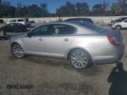 ✅ 2014 Lincoln MKS EcoBoost • VIN: 1LNHL9FT3EG600411 • Lot: 86684605. Listed on Copart with 76,702 mi. Free auction sales archive from the USA and detailed vehicle history report at DreamBid. Image 2.