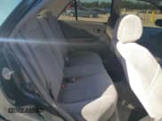 ✅ 1999 Mazda Protege DX • VIN: JM1BJ2222X0126273 • Lot: 75479364. Wystawiony na Copart z przebiegiem 293 952 mil. Bezpłatny archiwum sprzedaży aukcyjnych z USA i szczegółowy raport historii pojazdu na DreamBid. Zdjęcie 10.