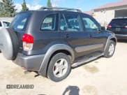 ✅ 2003 Toyota RAV4 • VIN: JTEHH20V730231013 • Lot: 43287923. Listed on IAAI with 106,474 mi. Free auction sales archive from the USA and detailed vehicle history report at DreamBid. Image 4.