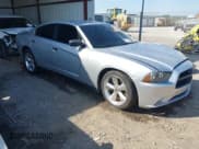 ✅ 2014 Dodge Charger Police • VIN: 2C3CDXAT6EH347732 • Lot: 43388299. Listed on IAAI with 144,952 mi. Free auction sales archive from the USA and detailed vehicle history report at DreamBid. Image 1.