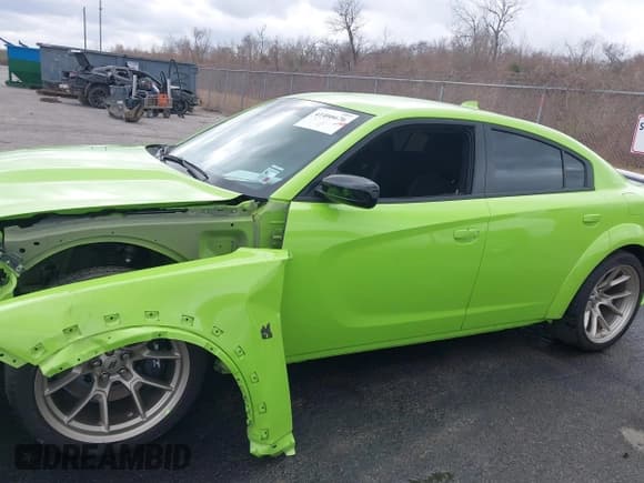 ✅ 2023 Dodge Charger Scat Pack Widebody • VIN: 2C3CDXGJ7PH591561 • Lot: 41466676. Listed on IAAI with 2,716 mi. Free auction sales archive from the USA and detailed vehicle history report at DreamBid. Image 15.