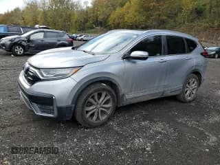 ✅ 2022 Honda CR-V Touring • VIN: 2HKRW2H91NH669022 • Лот: 86789565. Опубликован ранее на Copart с пробегом 98 581 миль. Бесплатный доступ к архиву аукционных продаж из США и подробный отчёт об истории автомобиля на DreamBid. Изображение 1.