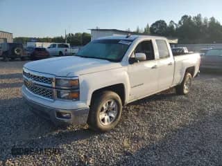 2015 Chevrolet Silverado 1500 LT with VIN 1GCRCREC2FZ405206, listed as a Copart auction lot 84038595 with 186,956 mi miles and Salvage title. Bid and sale history available at DreamBid. Image 1.