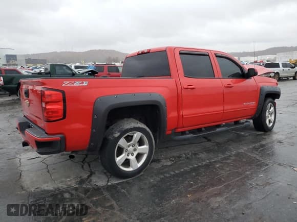 ✅ 2016 Chevrolet Silverado 1500 LT • VIN: 3GCUKREC3GG365068 • Лот: 77324543. Опубликован ранее на Copart с пробегом 126 313 миль. Бесплатный доступ к архиву аукционных продаж из США и подробный отчёт об истории автомобиля на DreamBid. Изображение 3.