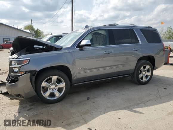 2020 Chevrolet Tahoe Premier with VIN 1GNSKCKC7LR125399, listed as a Copart auction lot 54702635 with 134,684 mi miles and Salvage title. Bid and sale history available at DreamBid. Image 1.