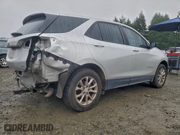 ✅ 2020 Chevrolet Equinox LS • VIN: 3GNAXSEV8LS704516 • Lot: 94379605. Wystawiony na Copart z przebiegiem 107 460 mil. Bezpłatny archiwum sprzedaży aukcyjnych z USA i szczegółowy raport historii pojazdu na DreamBid. Zdjęcie 3.