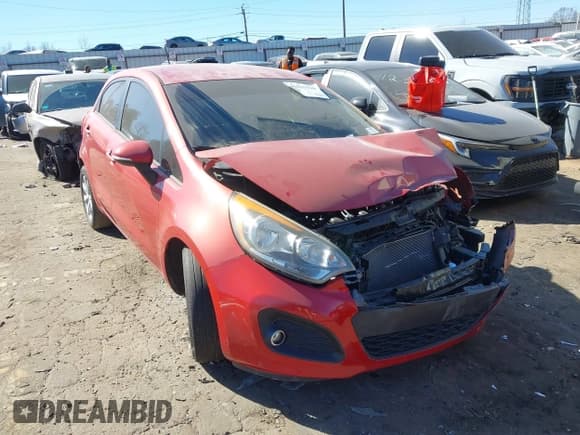 ✅ 2013 Kia Rio SX • VIN: KNADN5A36D6103285 • Lot: 41635510. Listed on IAAI with 124,486 mi. Free auction sales archive from the USA and detailed vehicle history report at DreamBid. Image 1.