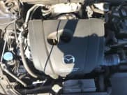 ✅ 2018 Mazda 3 Grand Touring • VIN: 3MZBN1M36JM256627 • Лот: 91292265. Опубликован ранее на Copart с пробегом 54 488 миль. Бесплатный доступ к архиву аукционных продаж из США и подробный отчёт об истории автомобиля на DreamBid. Изображение 14.