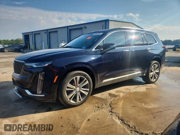 ✅ 2021 Cadillac XT6 Premium Luxury • VIN: 1GYKPDRS1MZ193755 • Лот: 71124125. Опубликован ранее на Copart с пробегом 101 210 миль. Бесплатный доступ к архиву аукционных продаж из США и подробный отчёт об истории автомобиля на DreamBid. Изображение 1.
