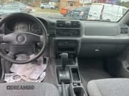 ✅ 1999 Isuzu Rodeo S • VIN: 4S2CK58W7X4357230 • Lot: 45724855. Listed on Copart with 130,446 mi. Free auction sales archive from the USA and detailed vehicle history report at DreamBid. Image 9.