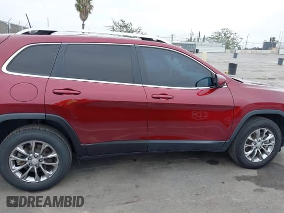 ✅ 2021 Jeep Cherokee 80th Anniversary • VIN: 1C4PJMMX1MD200569 • Lot: 42975007. Listed on IAAI with 79,573 mi. Free auction sales archive from the USA and detailed vehicle history report at DreamBid. Image 13.