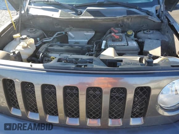 ✅ 2015 Jeep Patriot Latitude • VIN: 1C4NJPFA2FD397885 • Lot: 90947475. Listed on Copart with 155,880 mi. Free auction sales archive from the USA and detailed vehicle history report at DreamBid. Image 12.