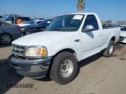 ✅ 1997 Ford F-150 • VIN: 1FTDF17WXVLA71129 • Lot: 43617497. Listed on IAAI with 230,491 mi. Free auction sales archive from the USA and detailed vehicle history report at DreamBid. Image 2.