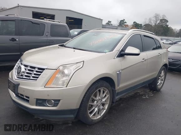 ✅ 2013 Cadillac SRX Premium Collection • VIN: 3GYFNEE38DS609566 • Лот: 43884327. Опубликован ранее на IAAI с пробегом 247 043 миль. Бесплатный доступ к архиву аукционных продаж из США и подробный отчёт об истории автомобиля на DreamBid. Изображение 2.