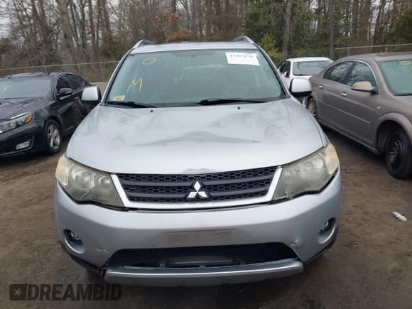 ✅ 2009 Mitsubishi Outlander SE • VIN: JA4MT31W89Z003101 • Lot: 41487678. Listed on IAAI with 90,226 mi. Free auction sales archive from the USA and detailed vehicle history report at DreamBid. Image 12.