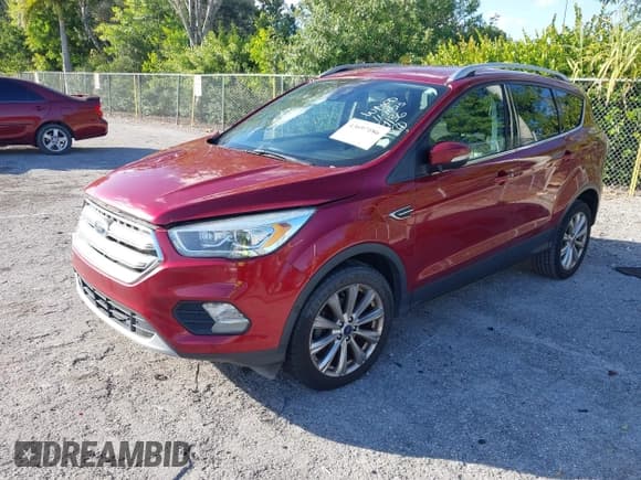 ✅ 2017 Ford Escape Titanium • VIN: 1FMCU0JD7HUA79136 • Lot: 43697186. Wystawiony na IAAI z przebiegiem 97 378 mil. Bezpłatny archiwum sprzedaży aukcyjnych z USA i szczegółowy raport historii pojazdu na DreamBid. Zdjęcie 2.