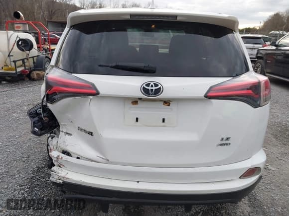 ✅ 2018 Toyota RAV4 LE • VIN: JTMBFREV7JJ214074 • Lot: 43688130. Listed on IAAI with 127,167 mi. Free auction sales archive from the USA and detailed vehicle history report at DreamBid. Image 16.
