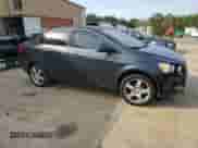 2014 Chevrolet Sonic LTZ с VIN 1G1JE5SG3E4113429, выставлен на аукционе Copart как лот 48419015 с пробегом 287 464 миль миль и Списание • Salvage title. История ставок и продаж доступна на DreamBid. Изображение 4.